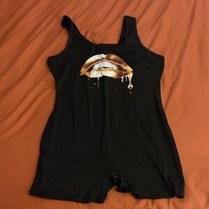 Kids Black One-Piece Romper with Metallic Gold Lip Print